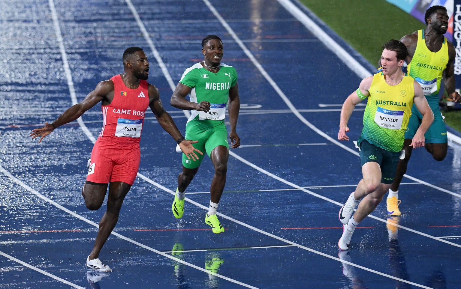 Eseme runs record-breaking 9.83 in the rain to win 100m gold in Glasgow:

Cameroon’s Emmanuel Eseme powered to a Commonwealth Games record of 9.83 to win the 100m in Glasgow on Tuesday
